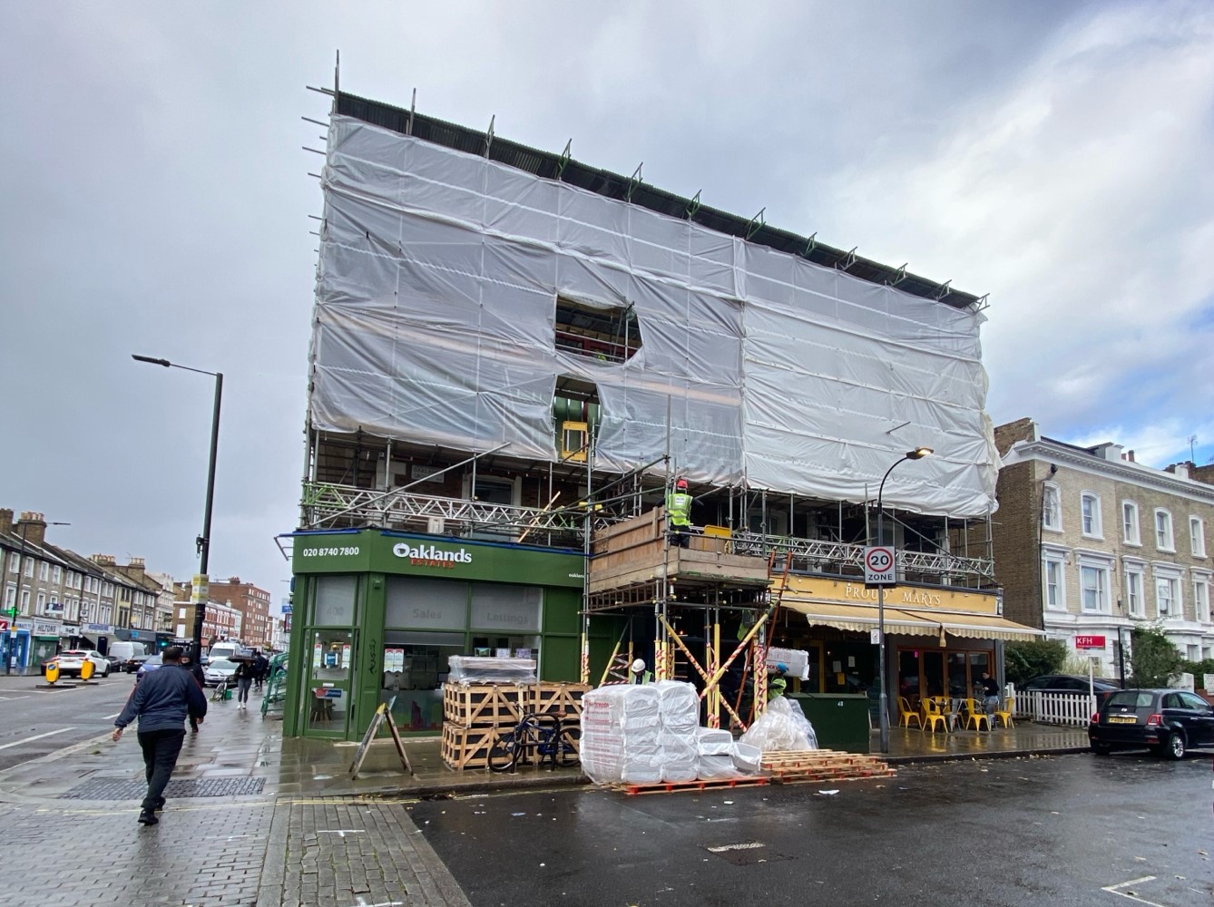 Scaffolding and shrink wrap active construction